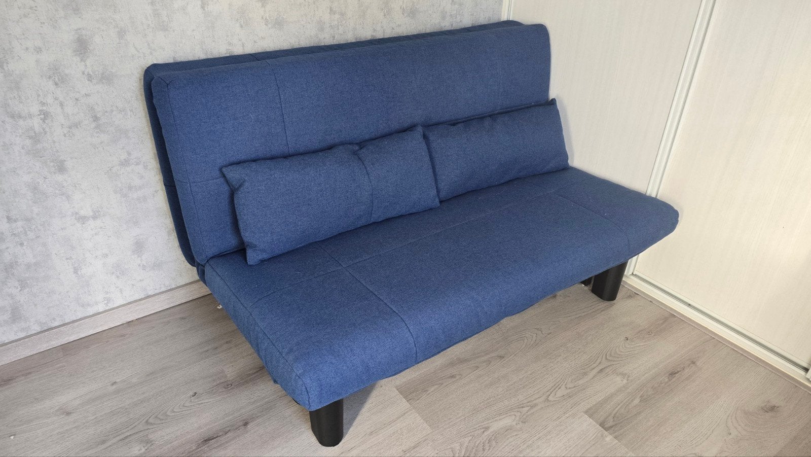 Blauwe slaapbank met kussens, Ophalen