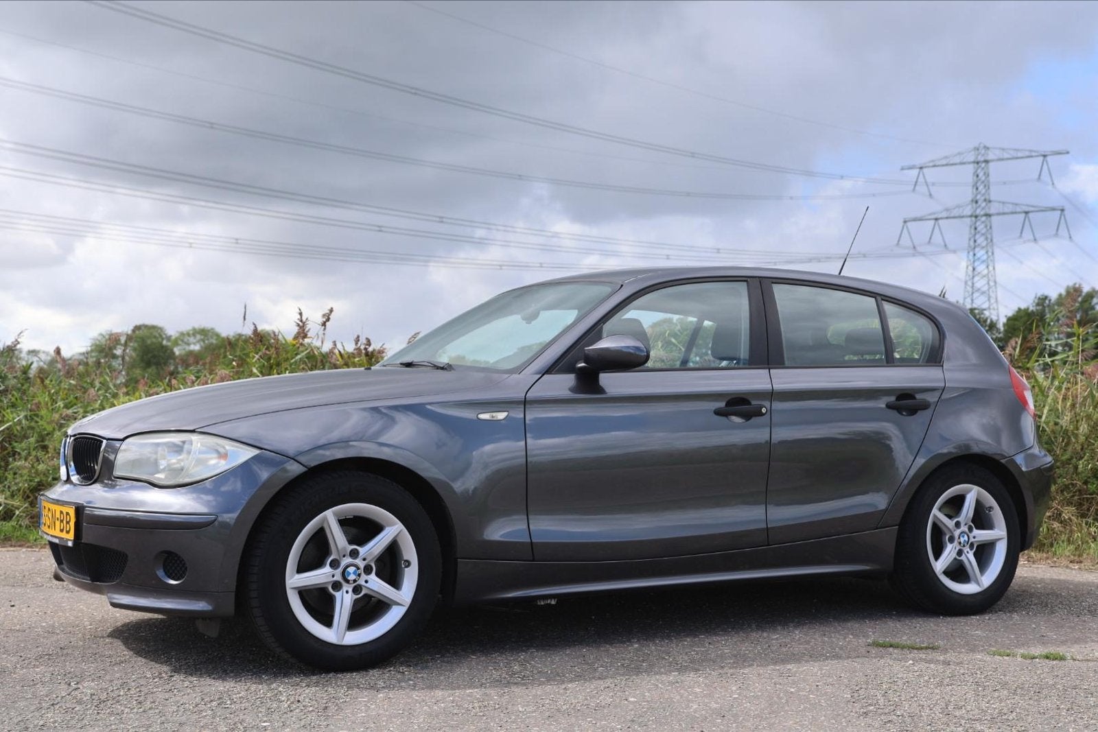 BMW 1-Serie 1.6 116I 2006 Grijs, Auto's, 1596 cc, Achterwielaandrijving, 4 cilinders, 635 kg