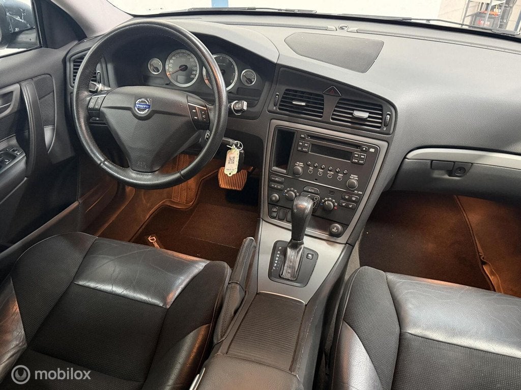 Volvo V70 2.4 Edition Classic 170PK / AUTOMAAT, Auto's, Volvo, Gebruikt, Automatische klimaatregeling, Blauw, 1498 kg