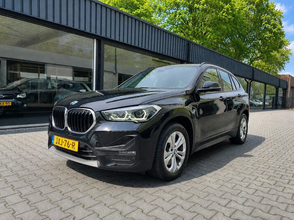 BMW X1 XDrive25e Head up display Navi Clima Cruise PDC Achte, Auto's, 8 kWh, Gebruikt, Zwart, Bedrijf