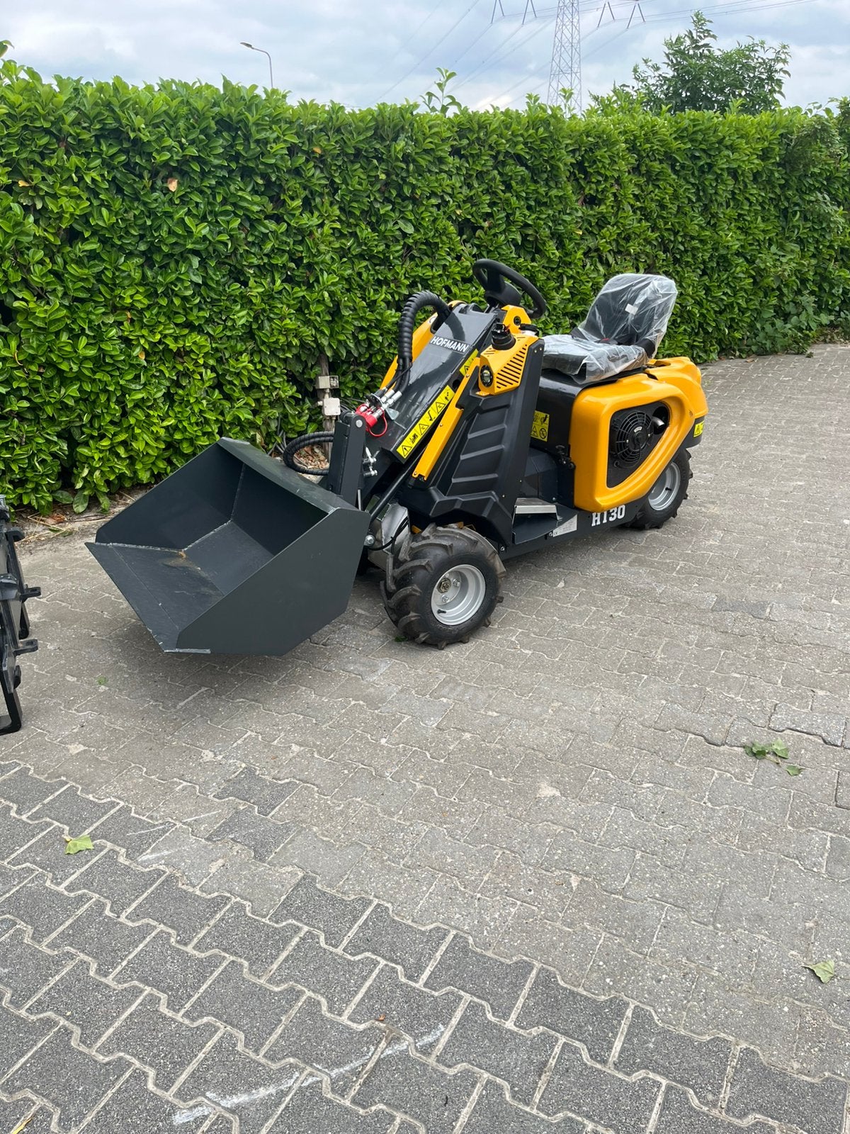 Hoffman 130 pro mini shovel/kniklader, Zakelijke goederen, Ophalen of Verzenden, Wiellader of Shovel