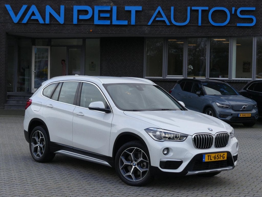 BMW X1 SDrive20i 192PK AUT Orange Edition II / LEDER /, Auto's, 1998 cc, Euro 6, Wit, SUV of Terreinwagen