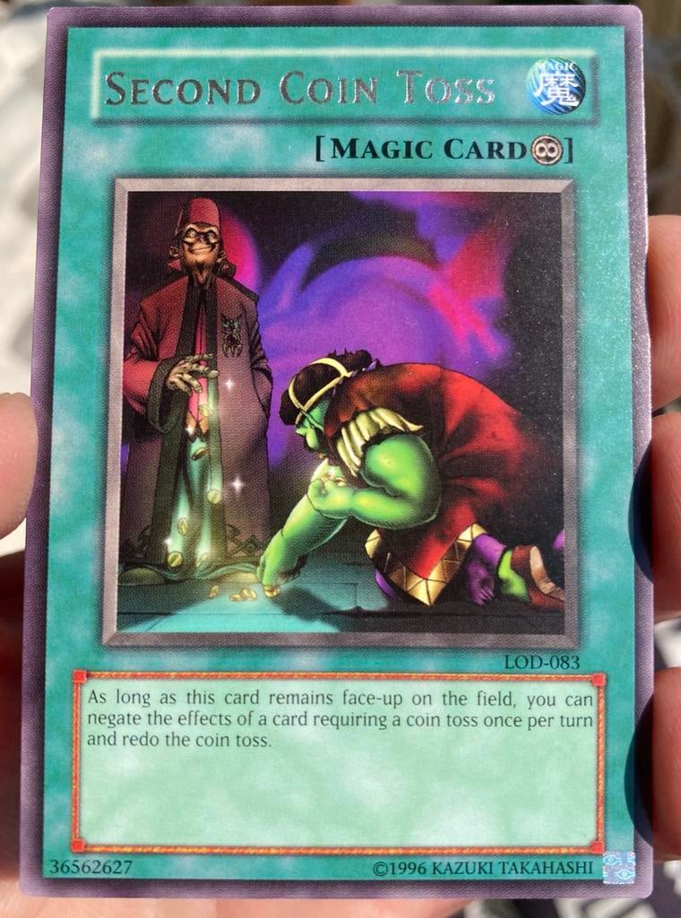 Yu-Gi-Oh! Second Coin Toss LOD Old US Magic Rare !, Ophalen of Verzenden, Gebruikt, Losse kaart