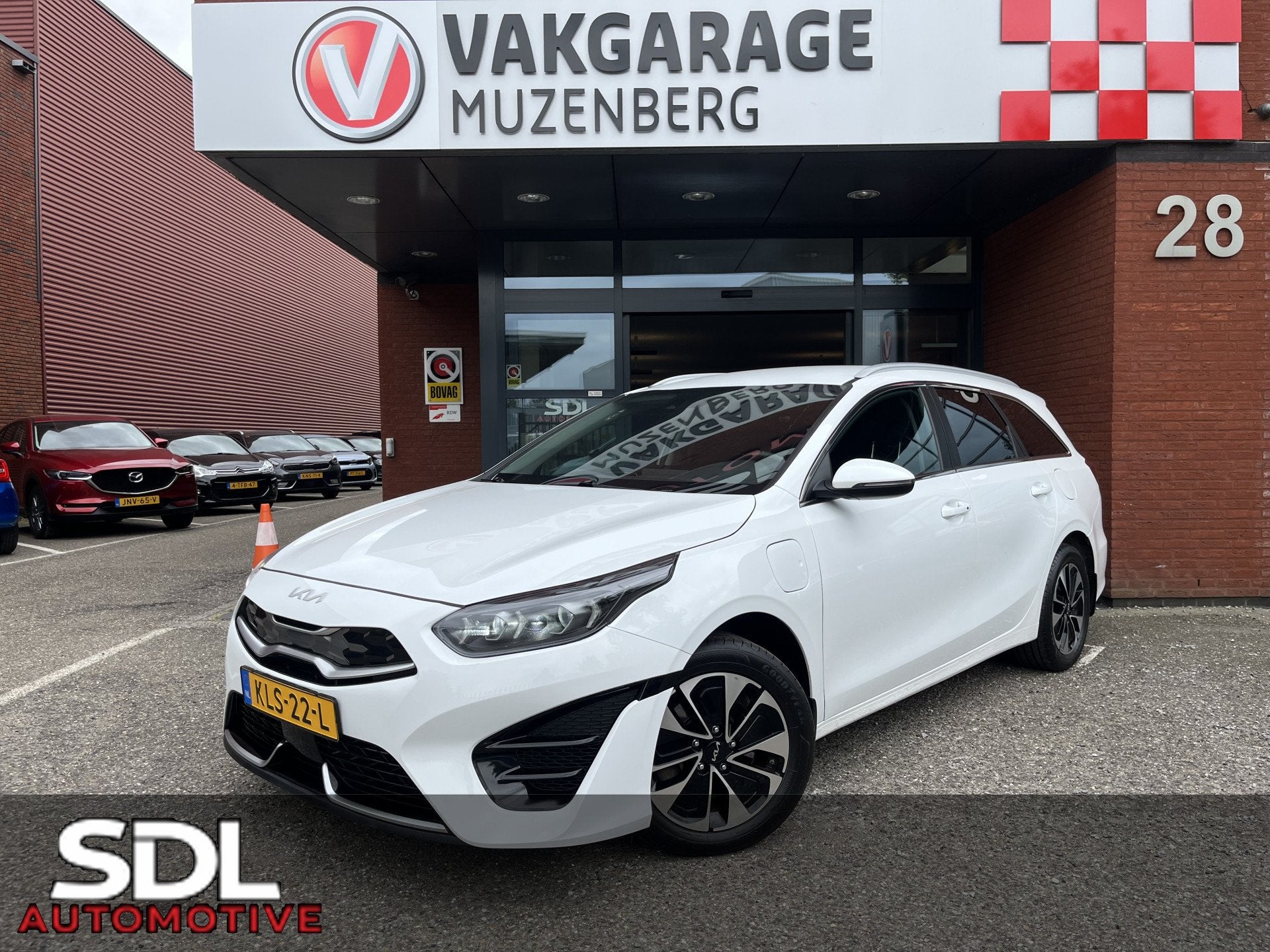 Kia Ceed Sportswagon 1.6 GDI PHEV DynamicLine // NAVI + CARP, Auto's, Gebruikt, Zwart, Wit, Hybride Elektrisch/Benzine