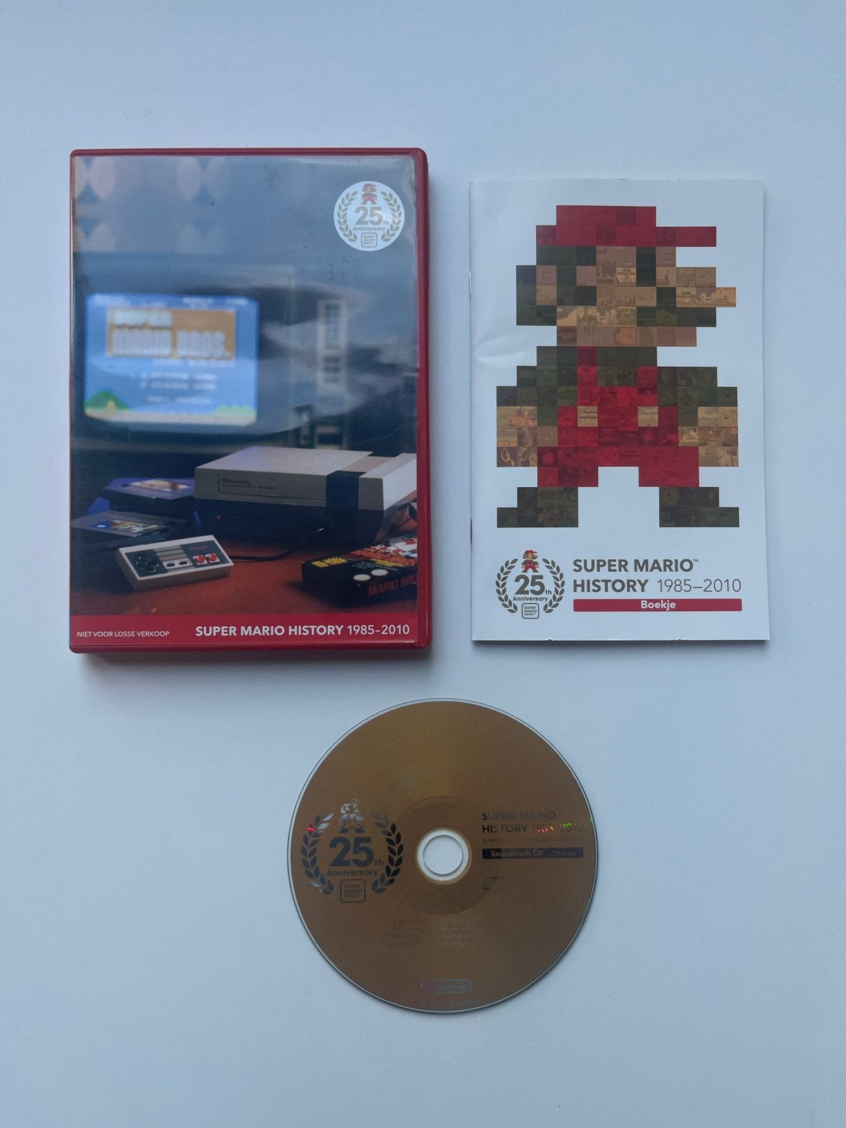 Super Mario History 1985-2010 - Nintendo Wii - Compleet, Ophalen of Verzenden, Zo goed als nieuw, Overige genres, Vanaf 3 jaar