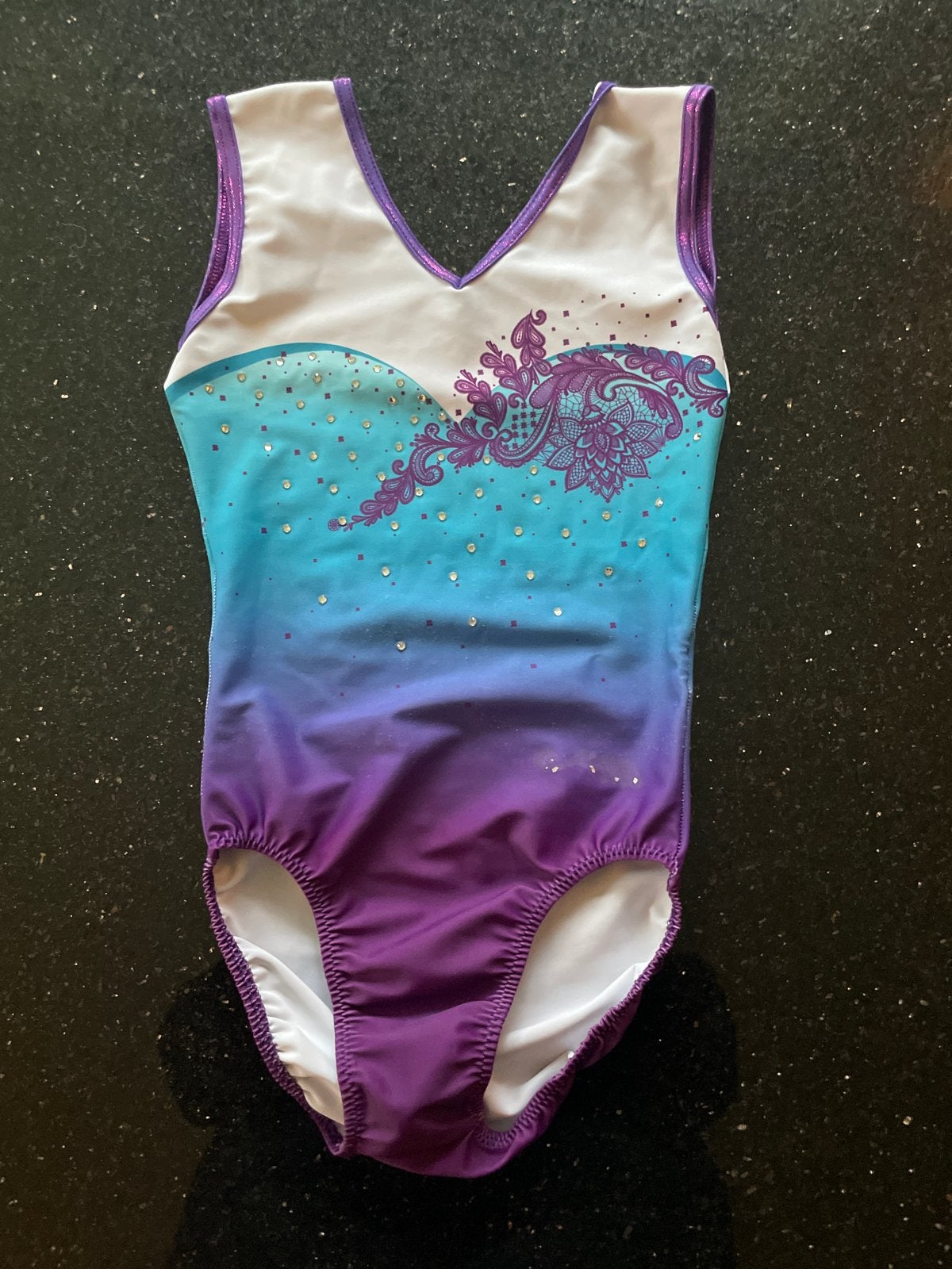 Moreau turnpakje maat 128, Ophalen of Verzenden, Gebruikt, Meisje, Sport- of Zwemkleding