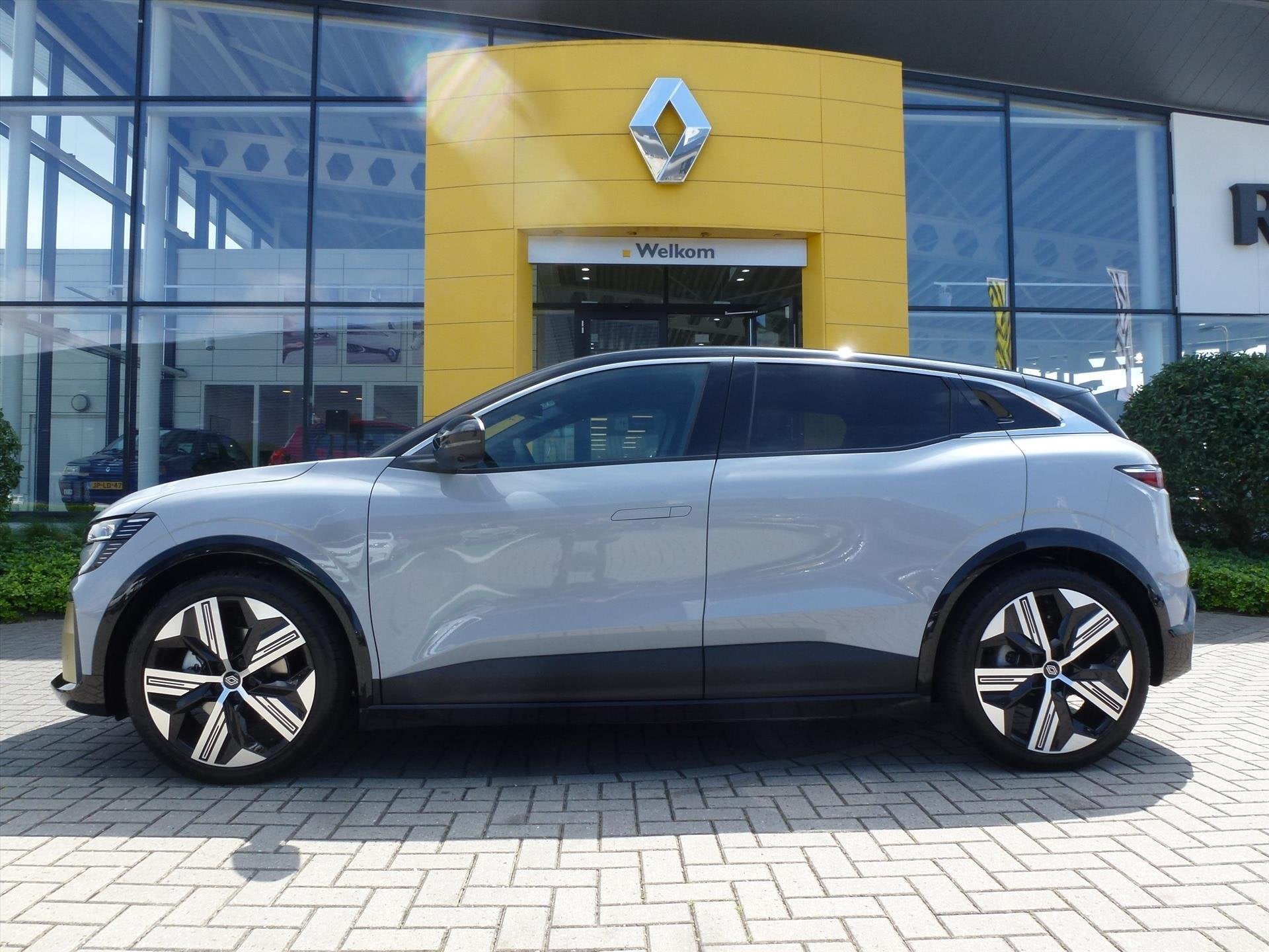 Renault Mégane E-Tech EV60 220pk Optimum Charge Ionic / War, Auto's, Dealer onderhouden, Zwart, Vierwielaandrijving, Zilver of Grijs