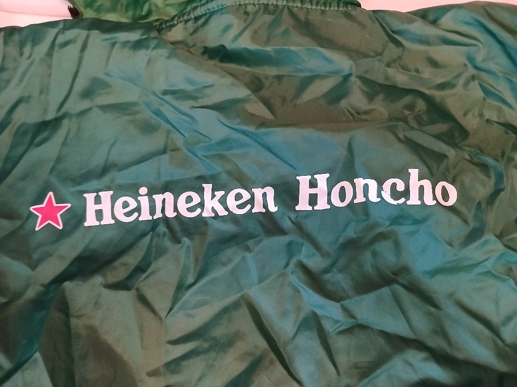 een leuke Heineken HONCHO, poncho en strandlaken in 1, Ophalen of Verzenden, Gebruikt, Overige typen, Heineken