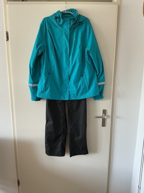 Als NIEUW: Regenjack/jas Human Nature maat xl - lichtgewicht, Caravans en Kamperen, Ophalen of Verzenden, Zo goed als nieuw, Regenjas