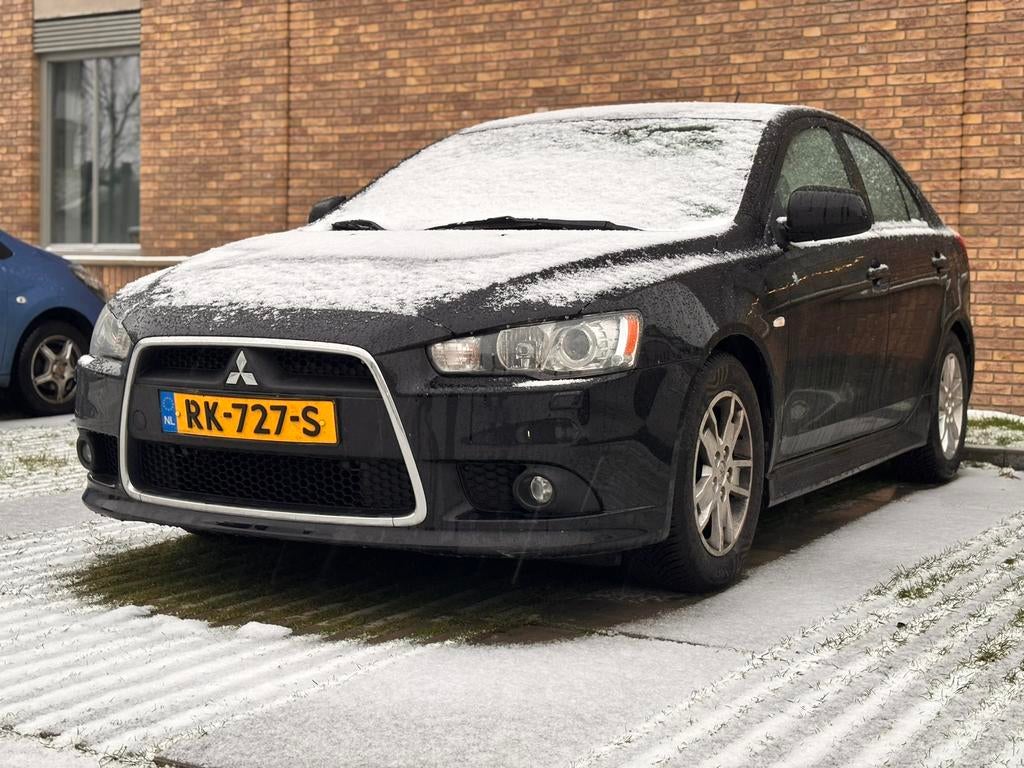 Mitsubishi Lancer 1.6 Cleartec Sportback 2013 Zwart, Auto's, Mitsubishi, Particulier, Lancer, ABS, Achteruitrijcamera, Airbags