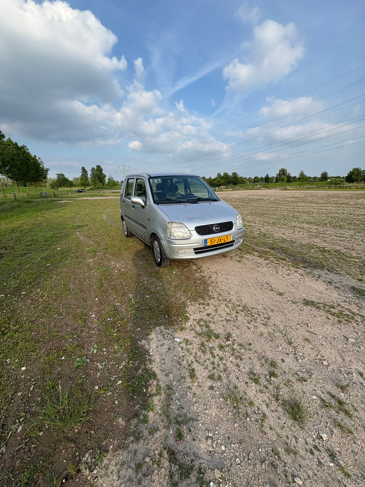Opel Agila 1.2 I 16V 2002 Grijs, Auto's, Voorwielaandrijving, 15 km/l, 74 pk, 31 €/maand