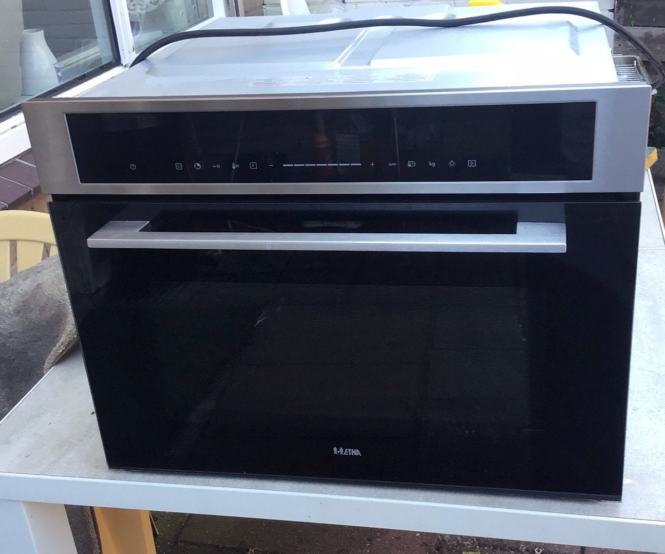 Etna CM250RVS Combimagnetron - Zonder rekken, Witgoed en Apparatuur, Magnetrons, Combimagnetron, Gebruikt, 60 cm of meer, Grill