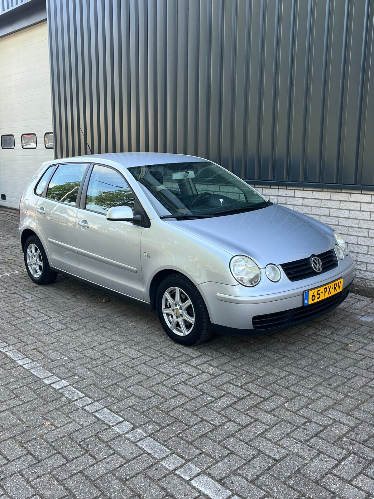 Volkswagen Polo 1.2 FUN 47KW 2005 Grijs, Auto's, 1198 cc, Origineel Nederlands, Bedrijf, Handgeschakeld