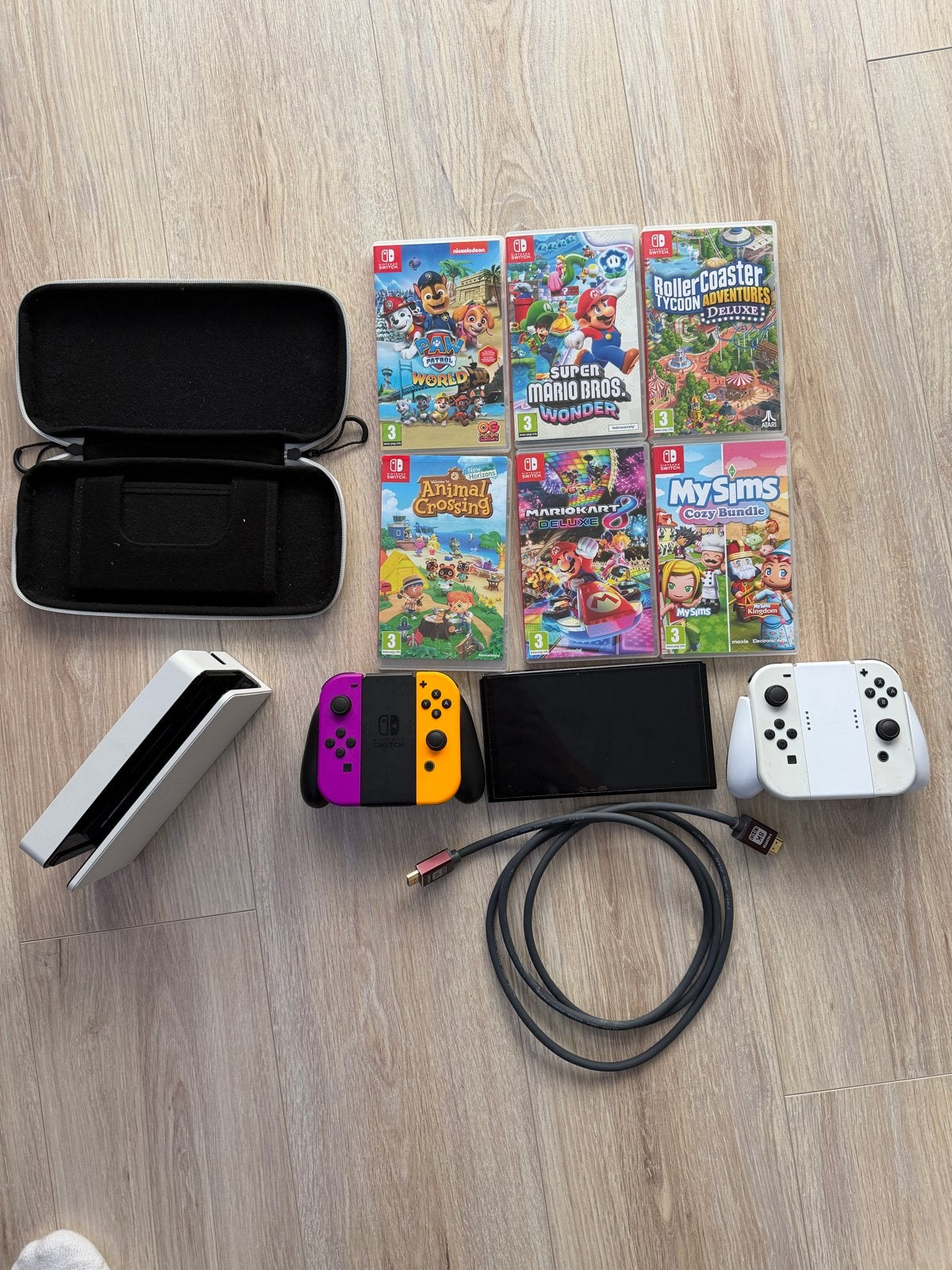 Nintendo Switch OLED met 6 games en accessoires, Spelcomputers en Games, Switch OLED, Met games, Ophalen of Verzenden, Zo goed als nieuw