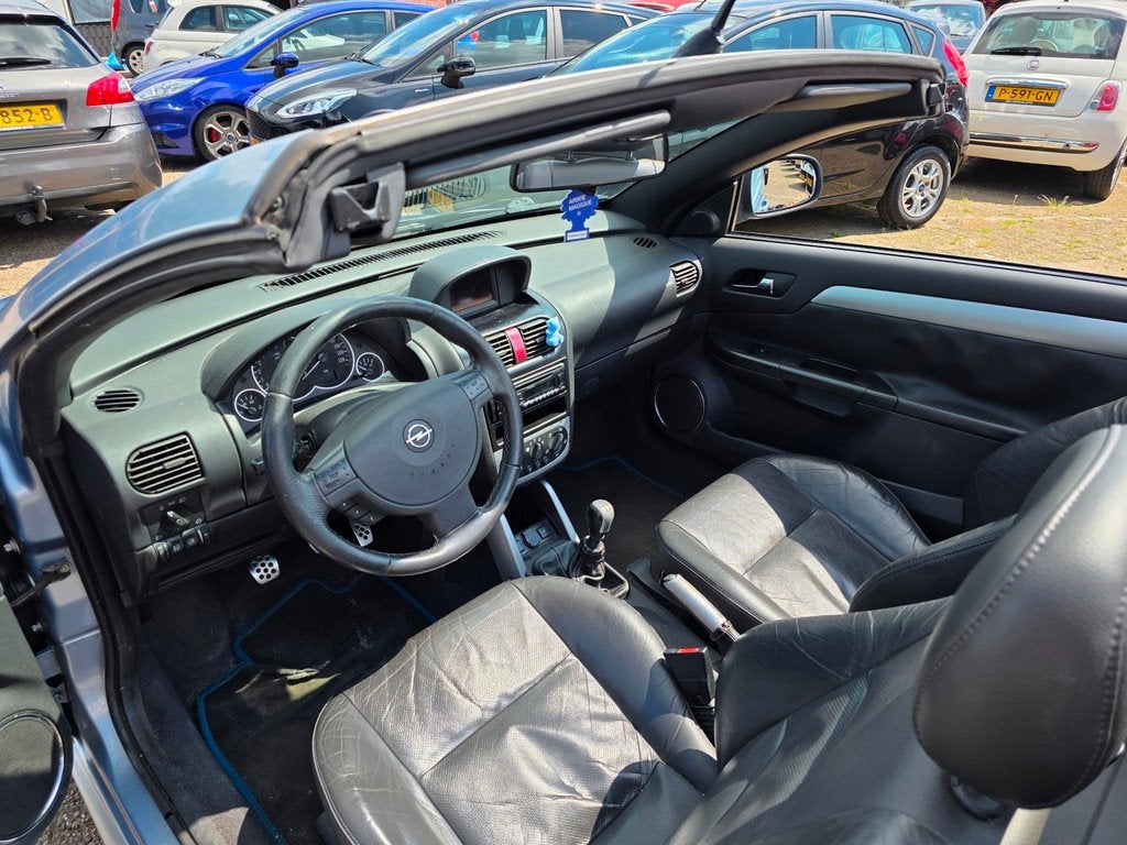 Opel Tigra TwinTop 1.8-16V Linea Rosso, Auto's, Opel, 125 pk, Gebruikt, 4 cilinders, Blauw