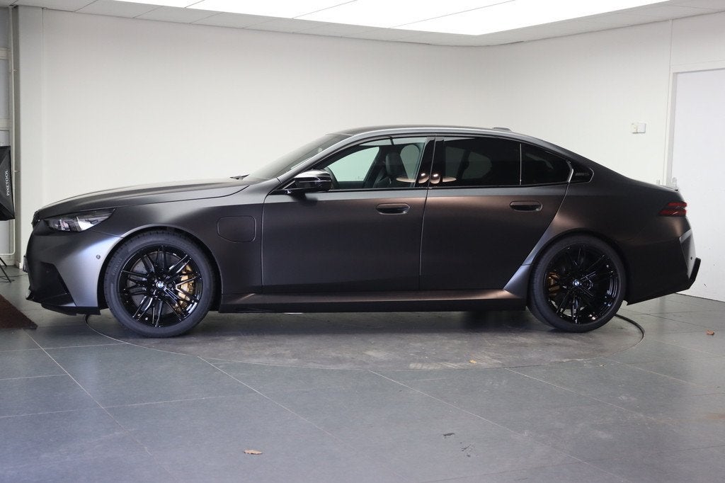 BMW 5 Serie M5 Automaat / M Drive Professional / Panoramadak, Auto's, BMW, 4395 cc, Leder, Hybride Elektrisch/Benzine, Sedan