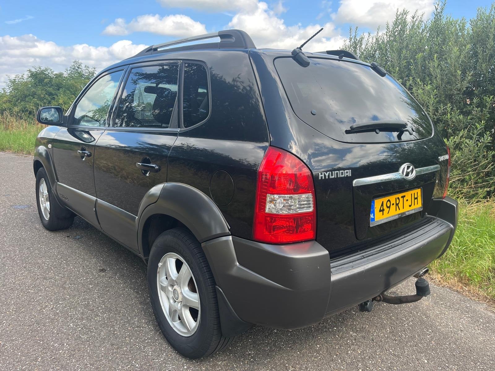 Hyundai Tucson 2.0i | Airco | Cruise | Trekhaak | APK mei 20, Auto's, Gebruikt, 4 cilinders, Zwart, Origineel Nederlands