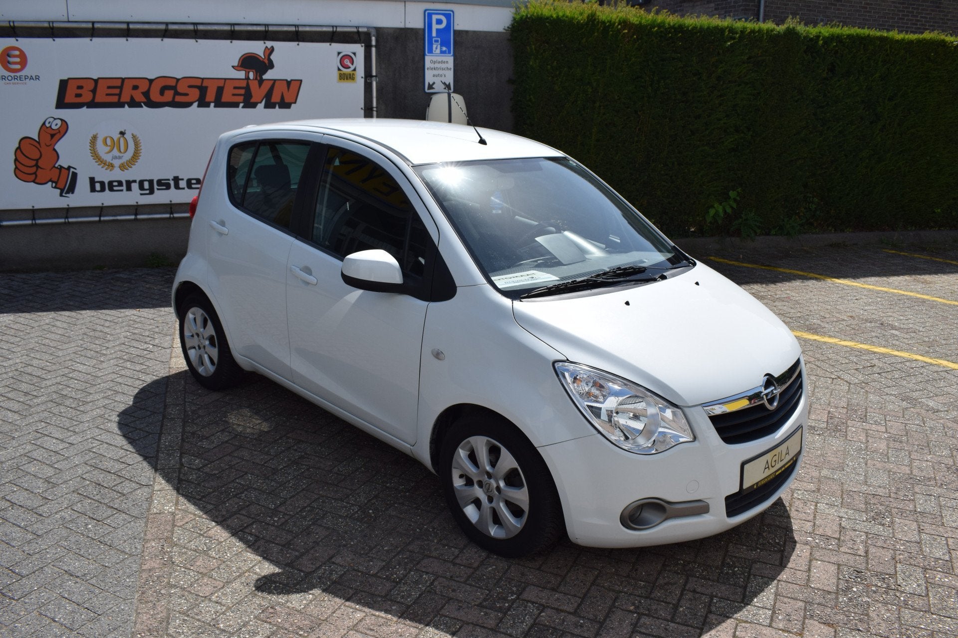 Opel Agila AUTOMAAT 1.2 Enjoy AIRCO (bj 2009), Auto's, 4 cilinders, Wit, Bedrijf, Geïmporteerd