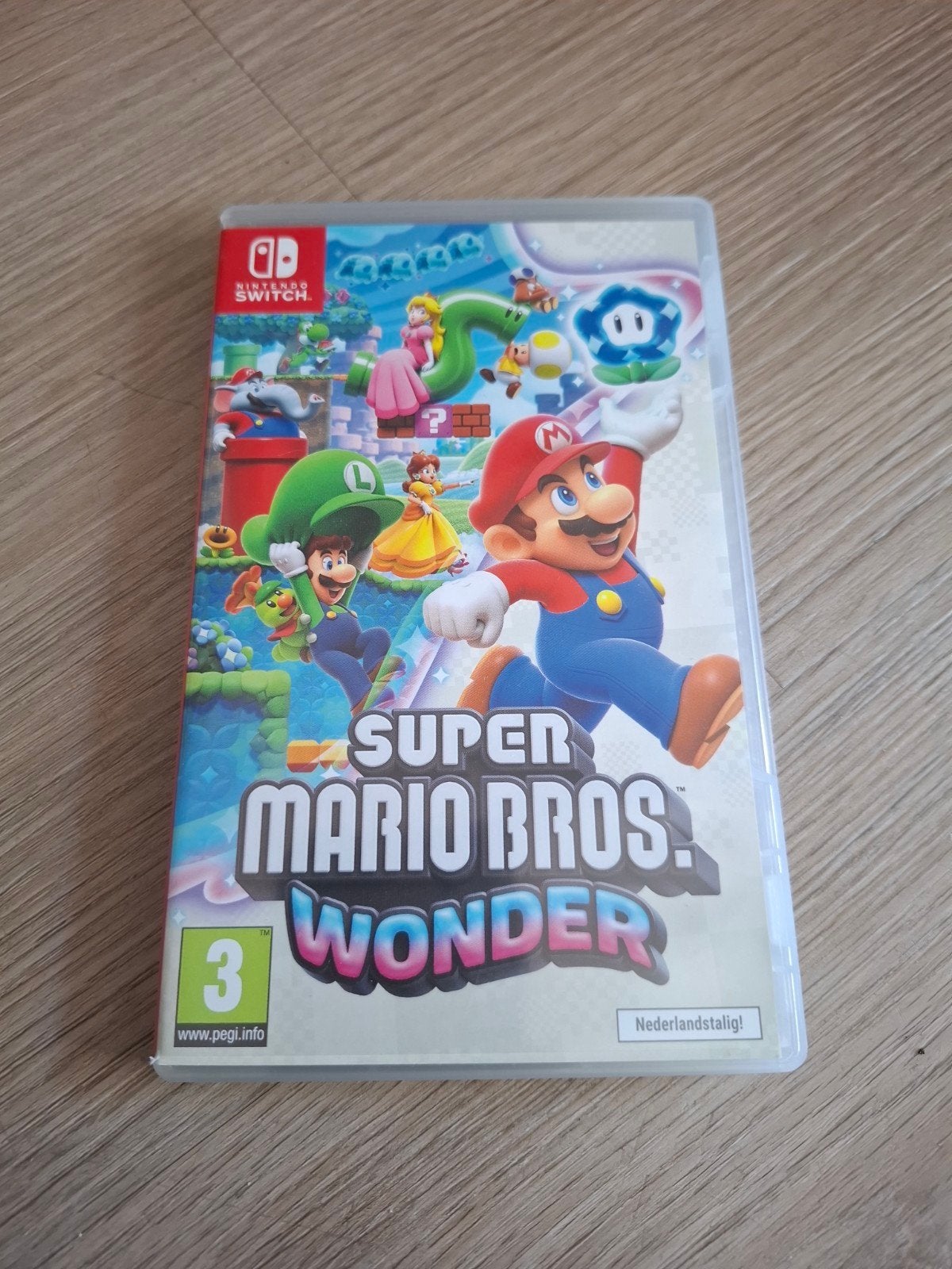 Super Mario Bros. Wonder - Nintendo Switch (Nederlandstalig), Spelcomputers en Games, Eén computer, Ophalen of Verzenden, Zo goed als nieuw