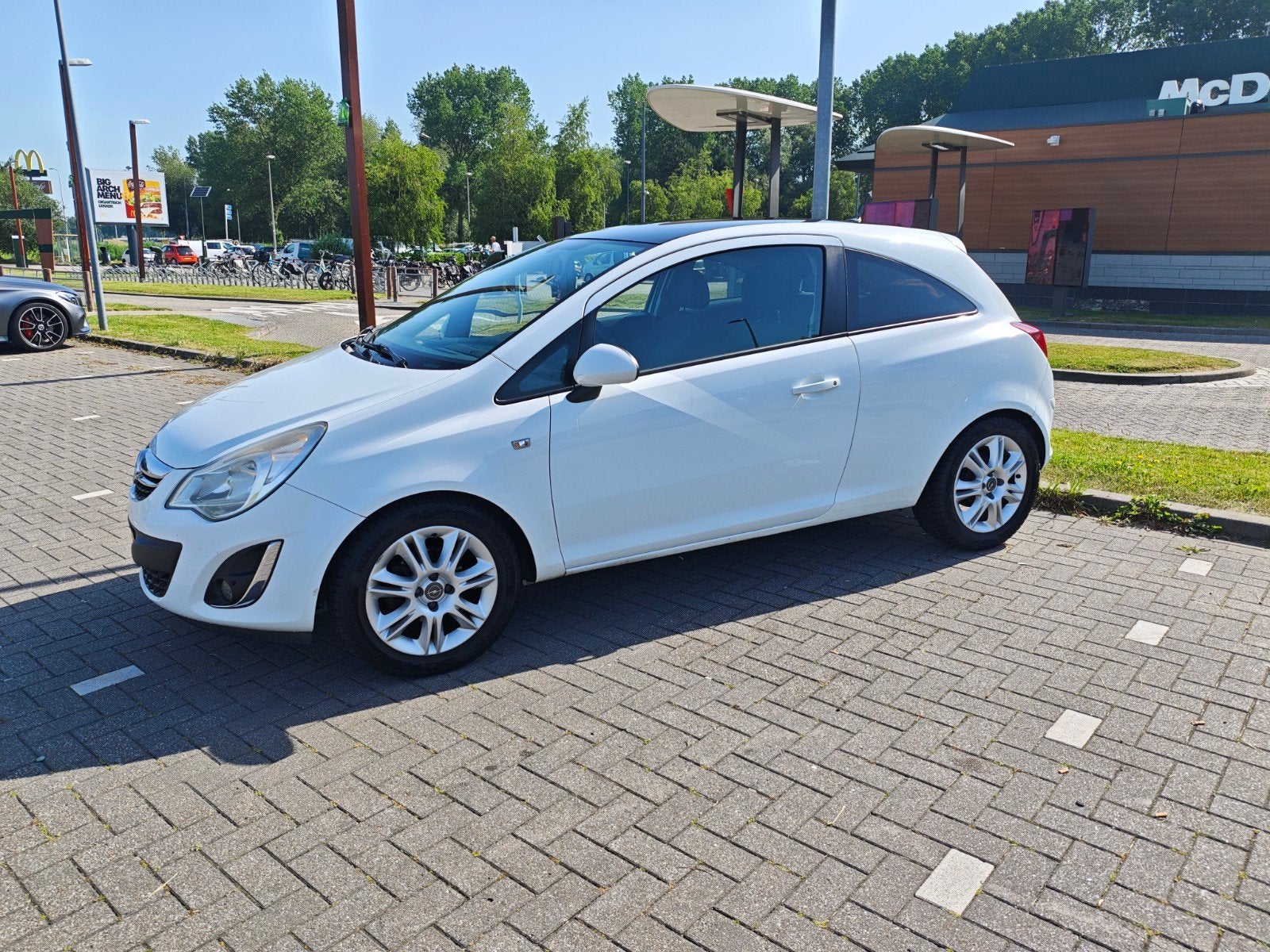 Opel Corsa 1.2 16V LPG 3D 2011 Wit, Auto's, Opel, Voorwielaandrijving, 83 pk, 4 cilinders, 1229 cc