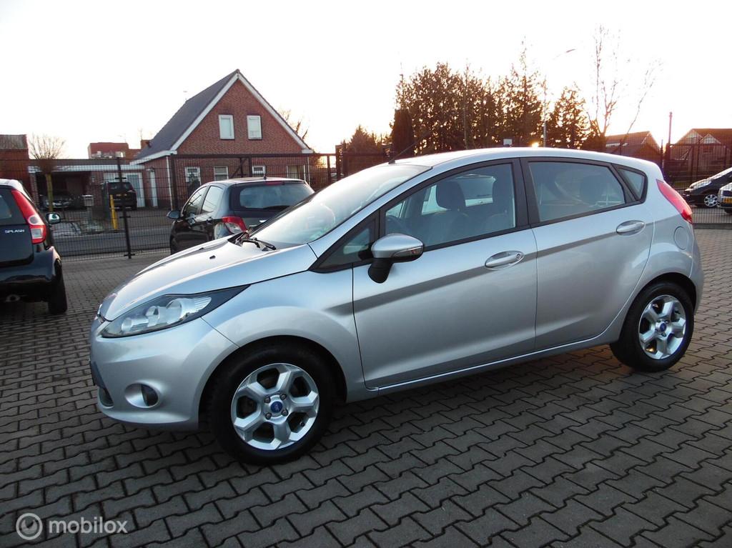 Ford Fiesta 1.25 5DRS AIRCO ELL PAK LMV, Voorwielaandrijving, Parkeersensor, Stof, 82 pk