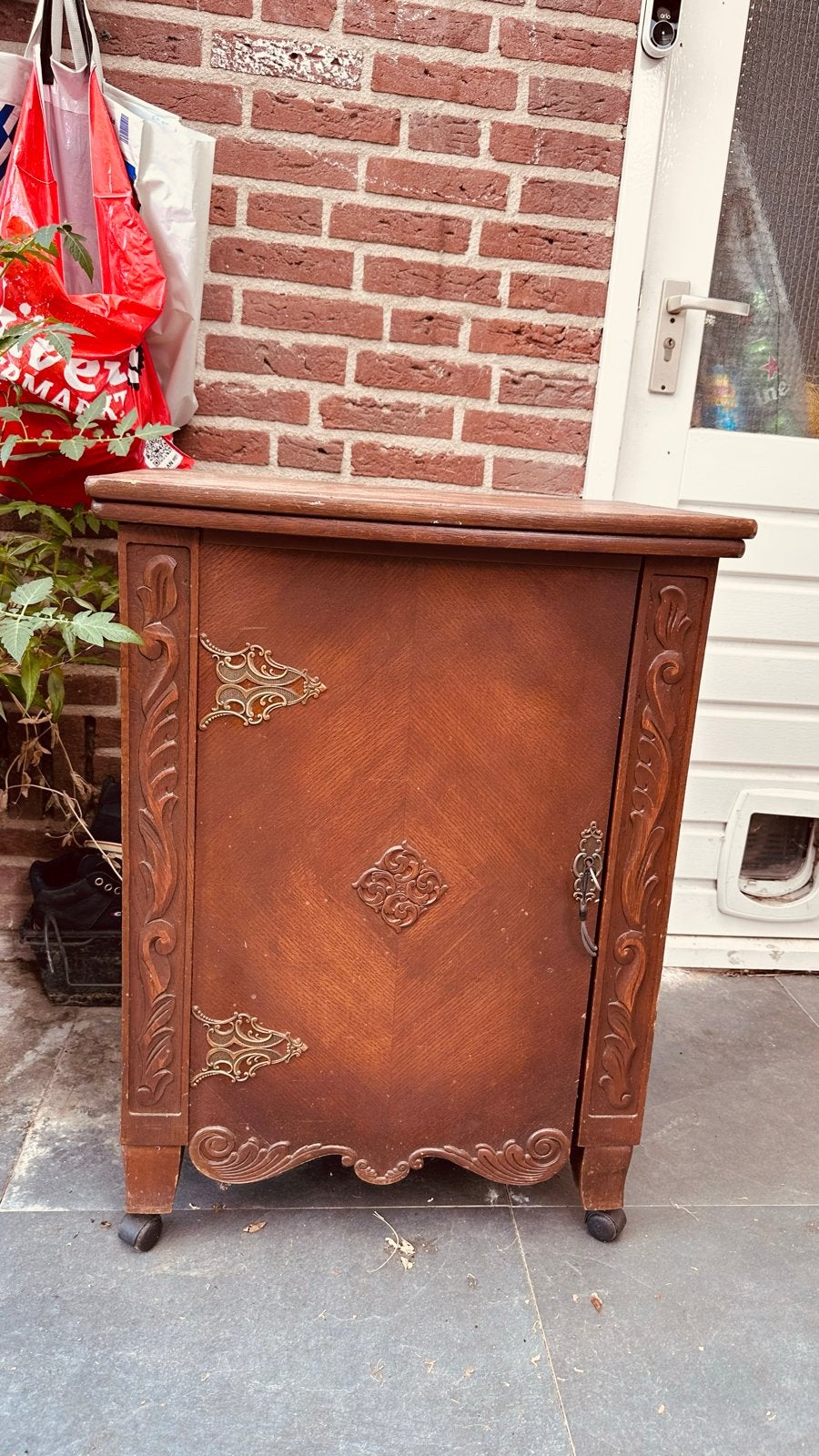 Vintage Gritzner naaimachine in houten kast, Ophalen