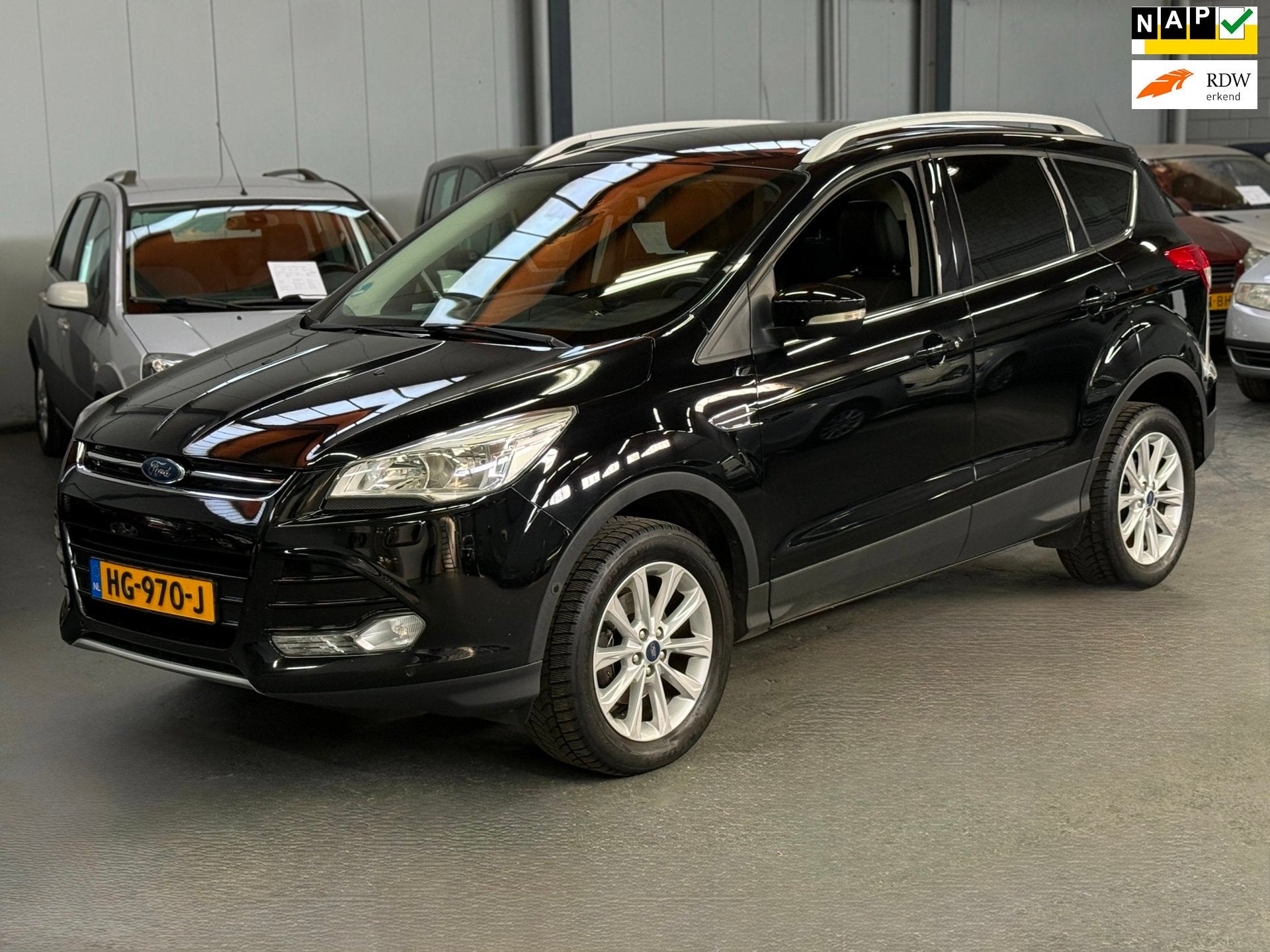 Ford Kuga 1.5 EcoBoost Titanium 150pk Trekhaak Navi Camera, Auto's, Ford, 4 cilinders, Leder en Stof, Zwart, Origineel Nederlands