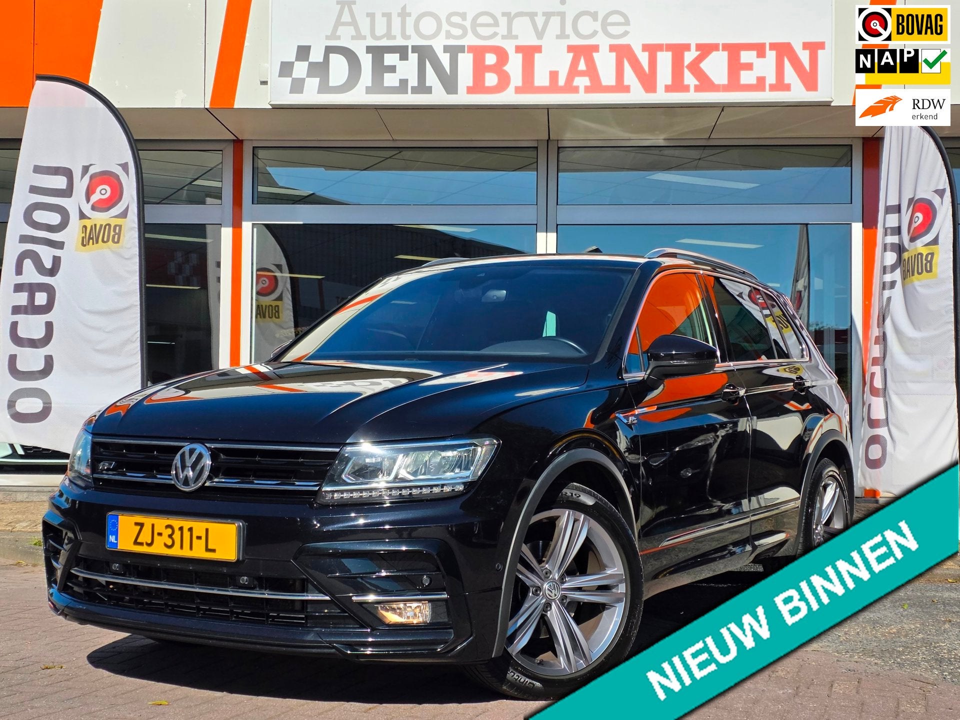 Volkswagen Tiguan 1.5 TSI ACT Highline Bns R-Line BJ.2019 /, Auto's, Dealer onderhouden, 4 cilinders, 150 pk, Zwart