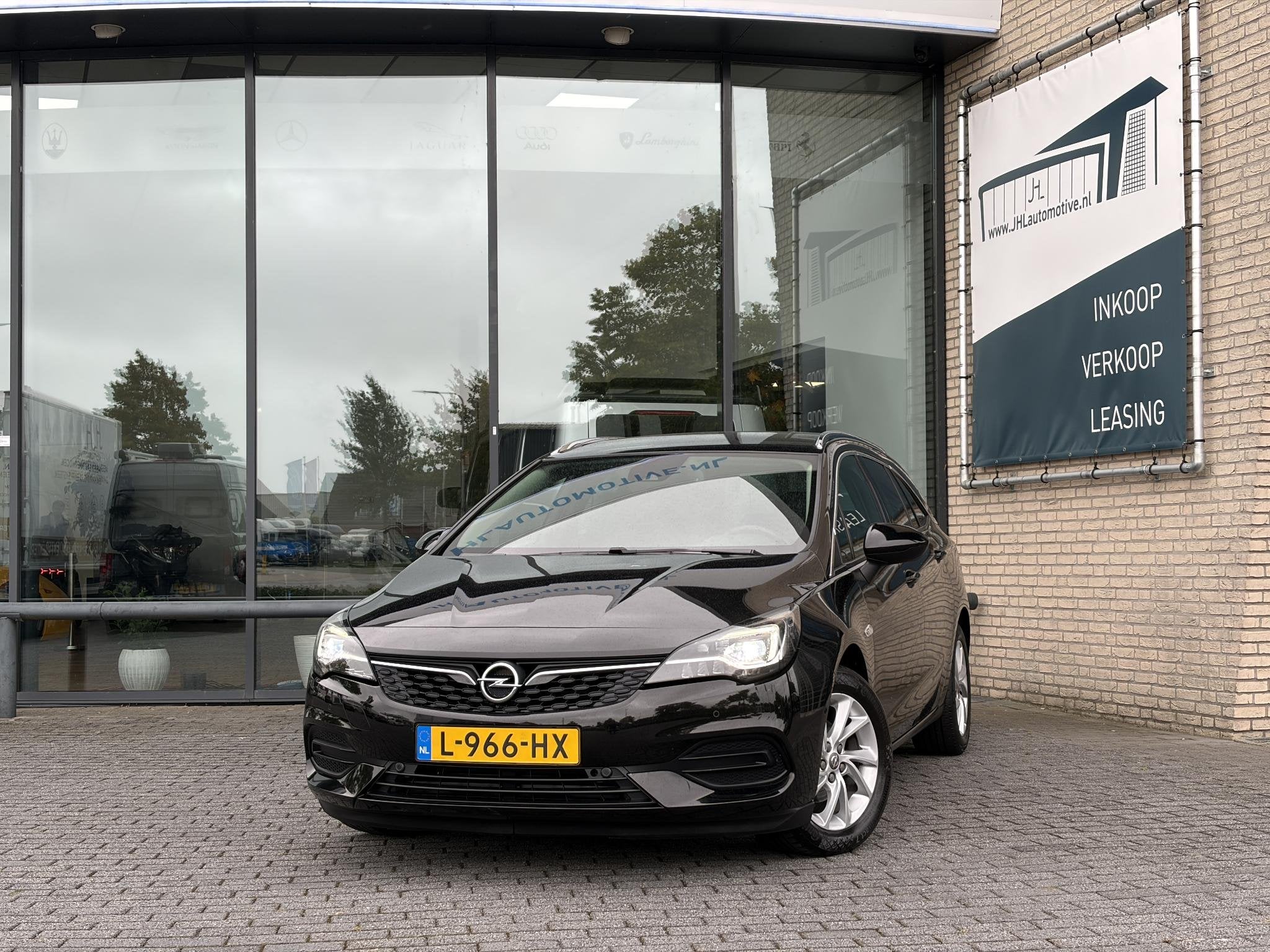 Opel Astra Sports Tourer 1.2*NAVI*ECC*CAM*CRUISE*HAAK*TEL*LE, Auto's, Voorwielaandrijving, Stof, Euro 6, 1199 cc
