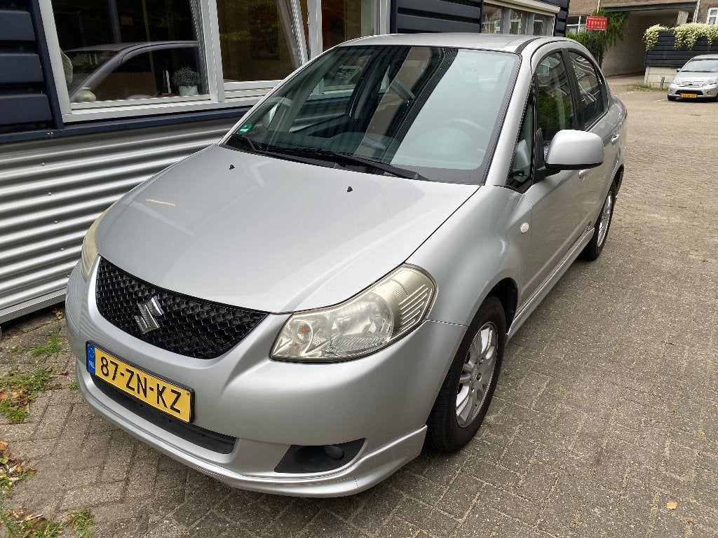 Suzuki SX4 Sedan 1.6 Exclusive –155.000km- Goed onderhouden!, Auto's, 4 cilinders, 49 €/maand, Origineel Nederlands, 1200 kg