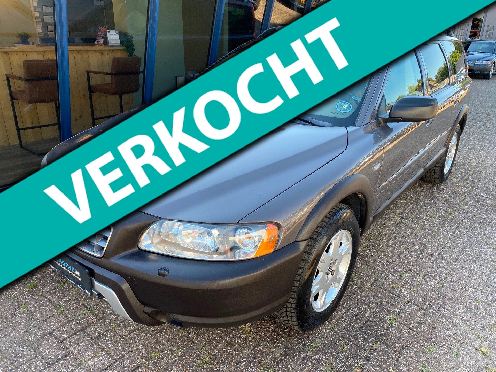 Volvo XC70 2.5 T Summum AWD Automaat LEER / XENON / TREKHAAK, Automaat, Gebruikt, Zwart, Bruin