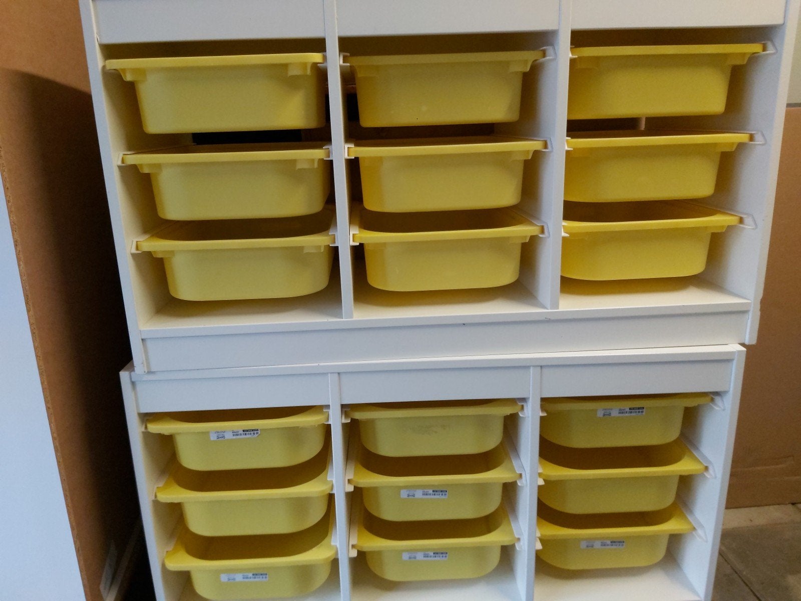 2 IKEA Trofast kasten met gele bakken, Ophalen