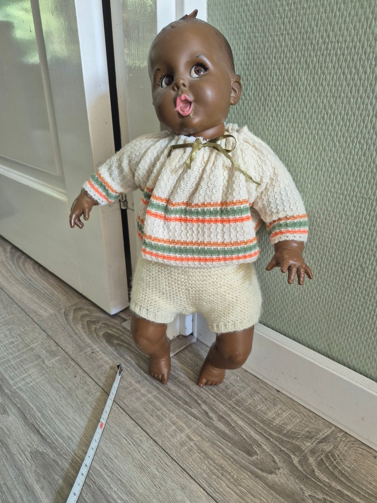 Vintage Babypop met rollende ogen en gebreide kleding, Ophalen of Verzenden