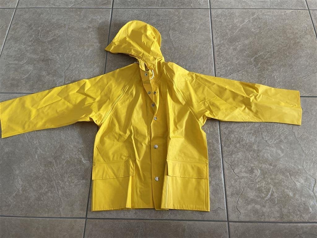 Helly Hansen regenjas - maat 10 jaar - geel, Caravans en Kamperen, Regenkleding, Nieuw, Regenjas, Ophalen of Verzenden
