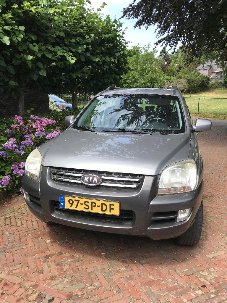 Kia Sportage 2.0 2WD 2006 Grijs, Auto's, 1442 kg, Zwart, 4 cilinders, Leder en Stof