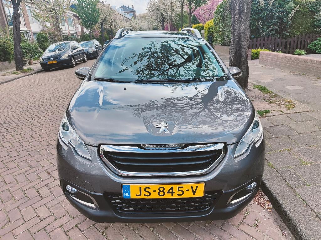 Peugeot 2008 1.2 VTI 60KW/82PK 2016 Grijs, Auto's, Voorwielaandrijving, Stof, 40 €/maand, Zwart