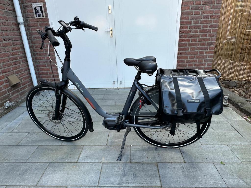 Stella e-bike met Hikemeister fietstas en AXA slot, Ophalen, Gebruikt