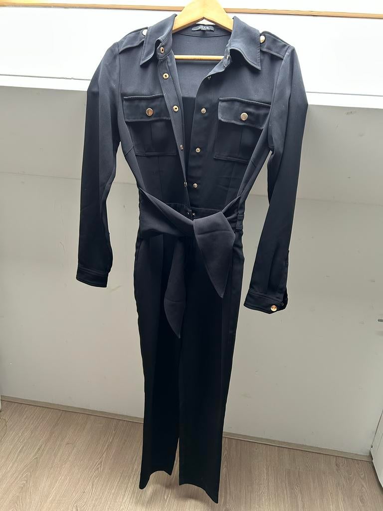 Nikkie jumpsuit maat 32 met strikceintuur, Kleding | Dames, Ophalen of Verzenden, Zo goed als nieuw, Maat 34 (XS) of kleiner, Zwart