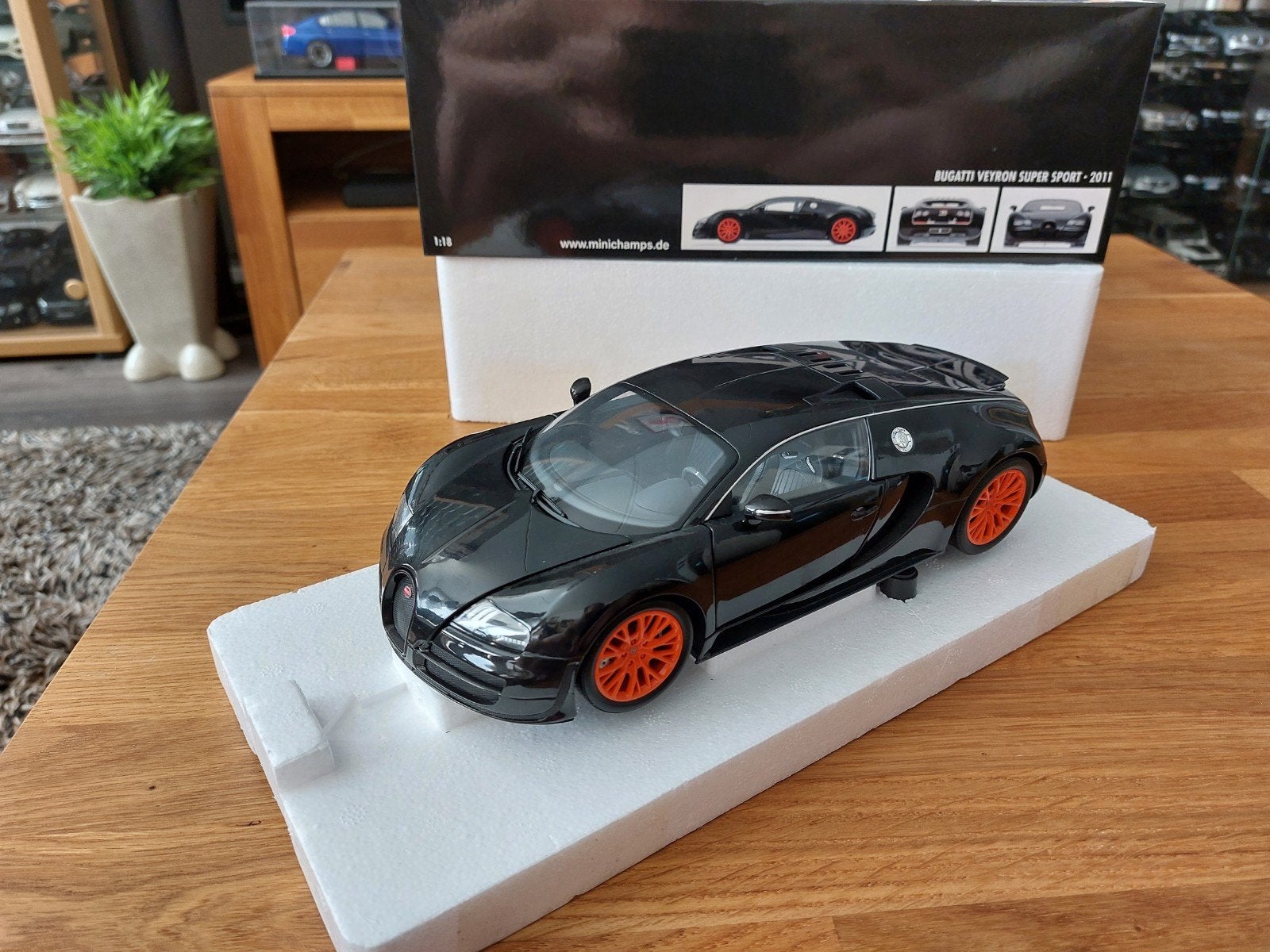 Minichamps 1/18 Bugatti veyron Super sport Black Metallic, Ophalen of Verzenden, Zo goed als nieuw, Auto, MiniChamps