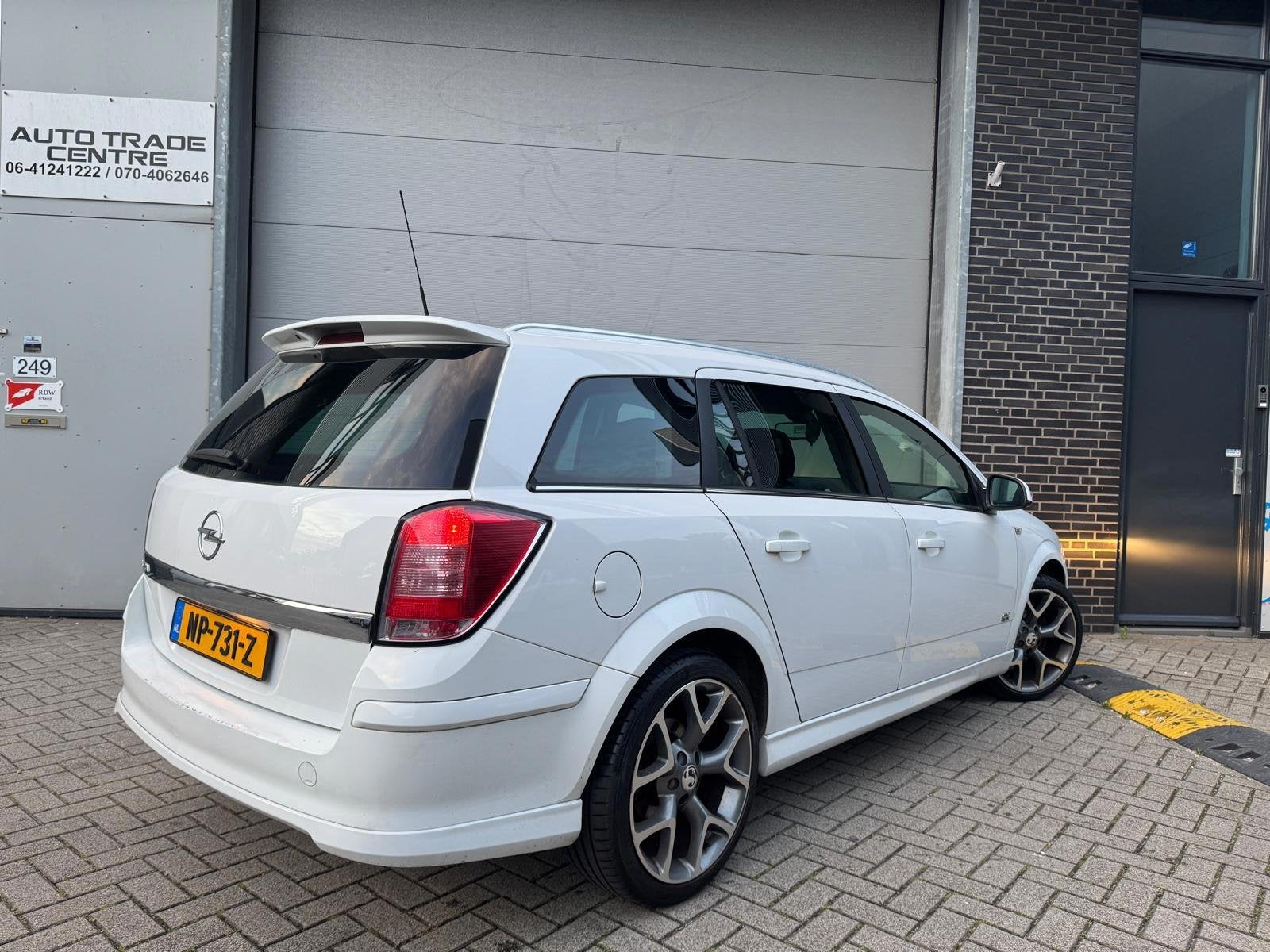 Opel Astra Wagon 1.6 Cosmo OPC Line, Auto's, Voorwielaandrijving, Gebruikt, Zwart, 116 pk