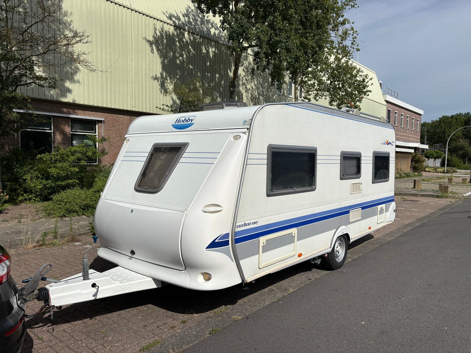 Hobby 495 UFE uit 2003 met dakairco, mover en voortent, Caravans en Kamperen, Rondzit, Hobby, Airco, Particulier