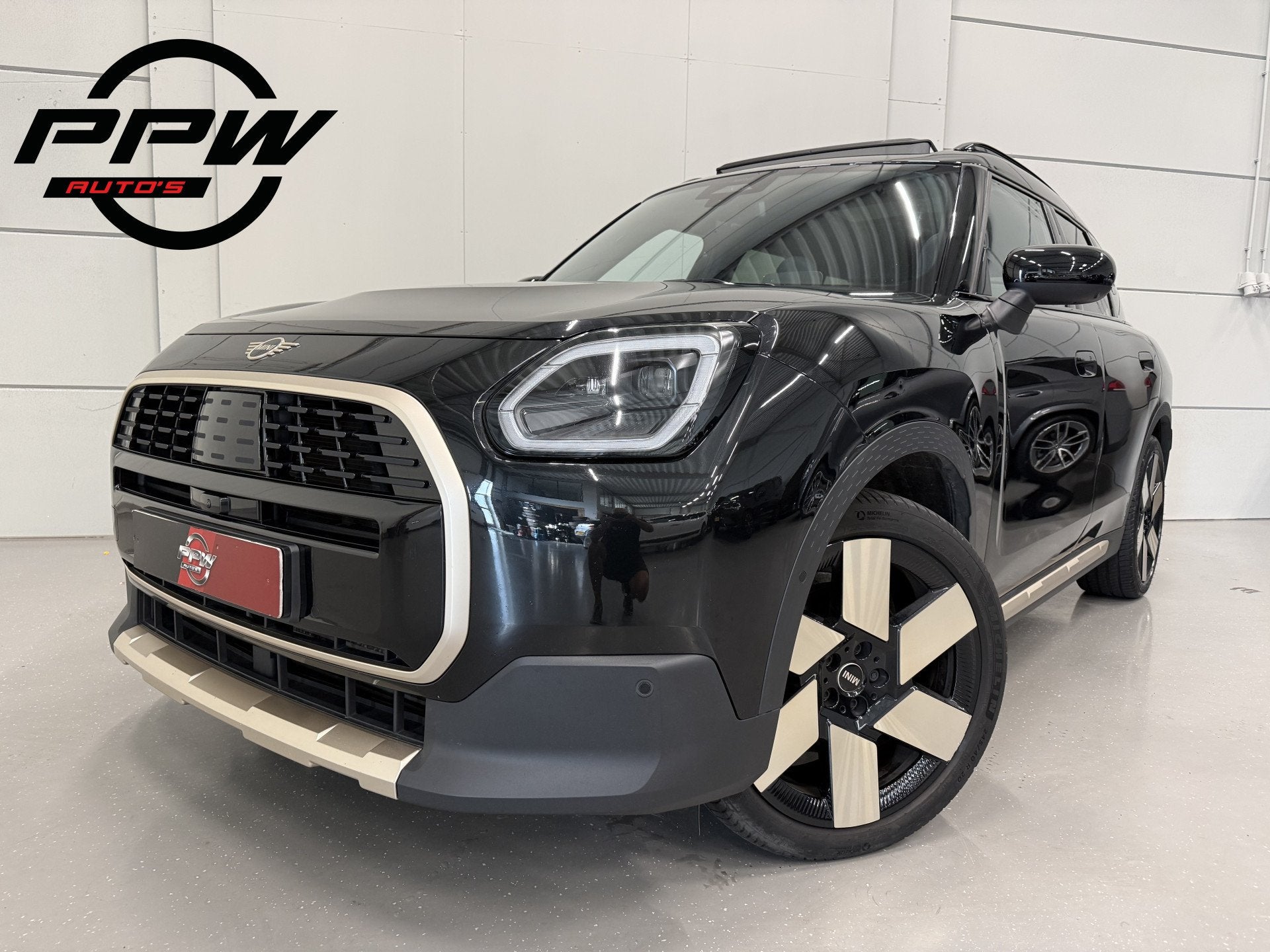 MINI Countryman 1.5 C JCW Favoured PANO/20"/JCW DARK-PETROL, Gebruikt, Met garantie (alle), Zwart, Leder