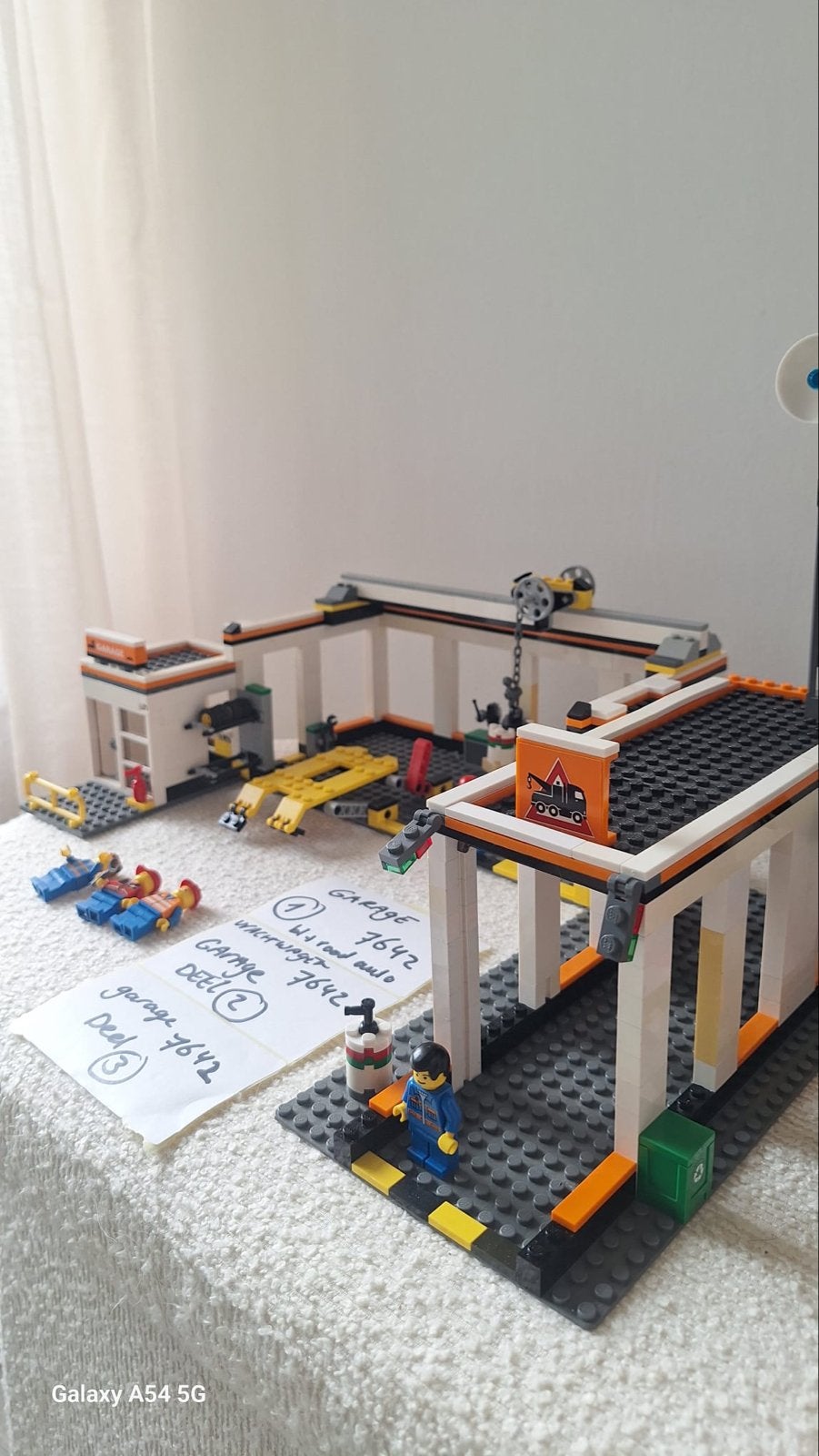LEGO City Garage 7642 met sleepwagen en minifiguren, Lego, Ophalen of Verzenden, Compleet, Complete set