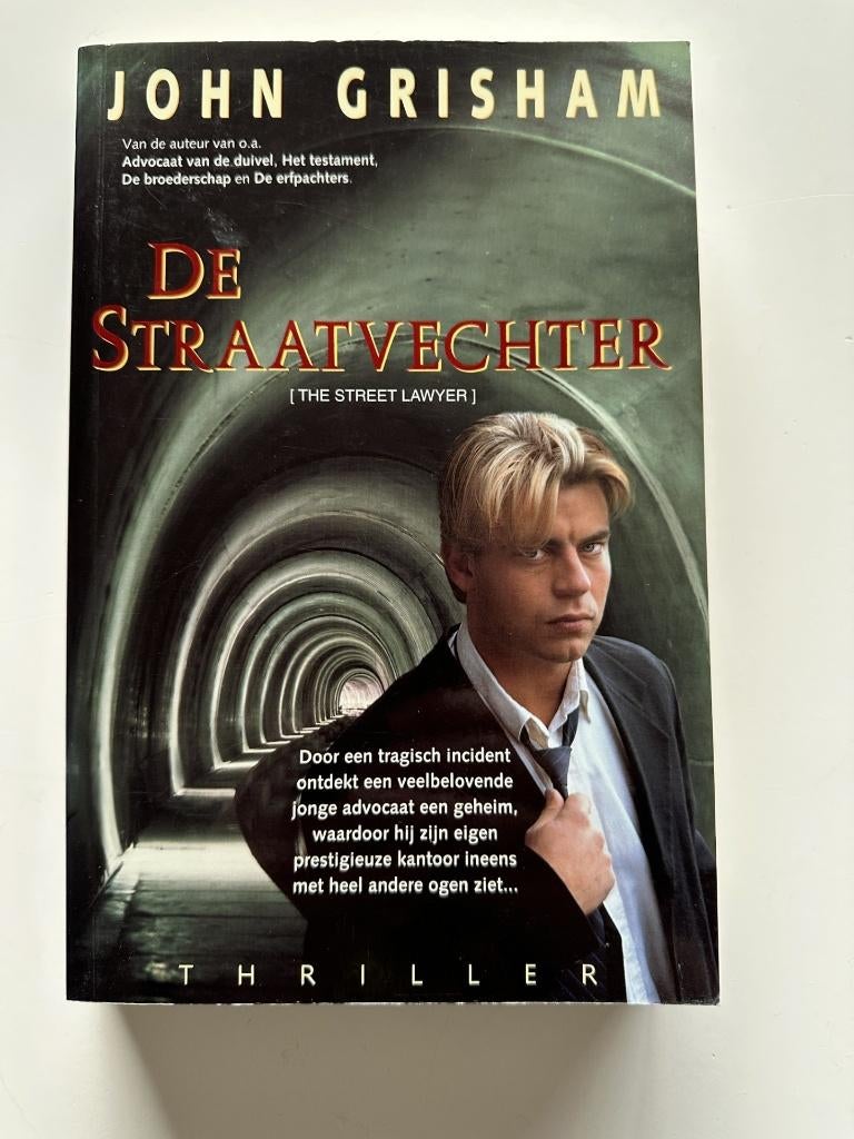 John Grisham – De straatvechter, Ophalen of Verzenden, Zo goed als nieuw, John Grisham, Amerika