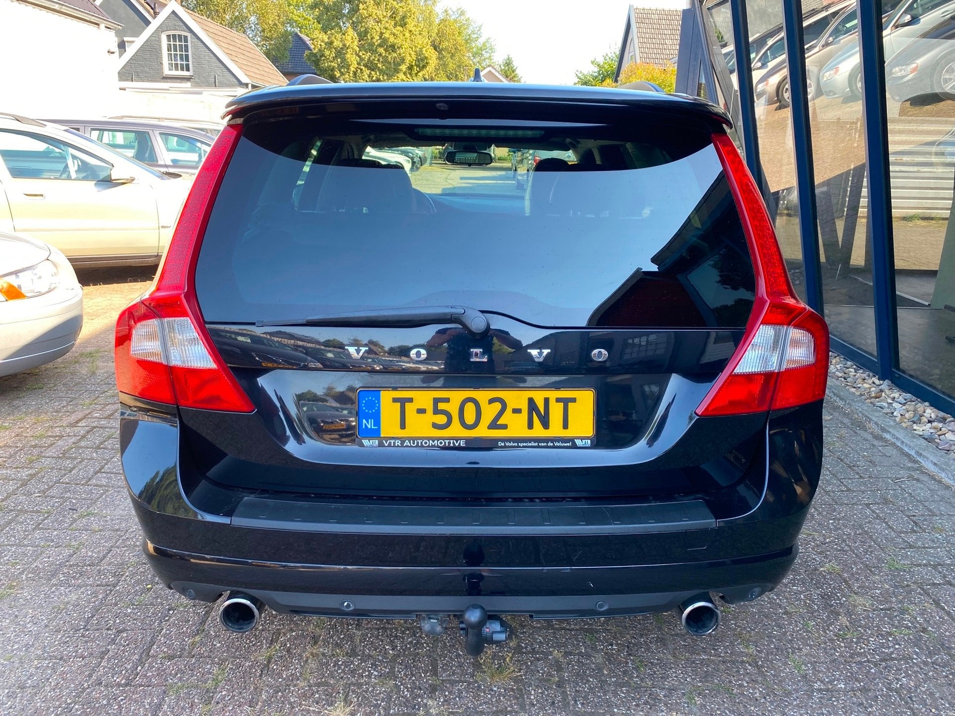 Volvo V70 2.5FT R-Design 230PK LEER / XENON / PDC / TREKHAAK, Auto's, Volvo, Gebruikt, Zwart, Handgeschakeld, Automatische klimaatregeling