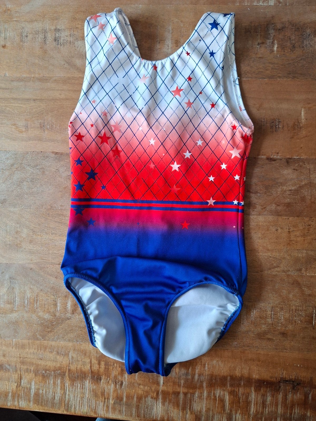 Turnpakje op maat, soepele stof, rood/blauw/wit sterren, Blauw, Zo goed als nieuw, Turnpak(je), Kindermaat 122 t/m 140