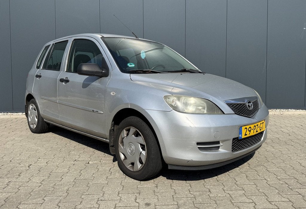 Mazda 2 1.4 Exclusive Airco Trekhaak Handel of Export, Voorwielaandrijving, 1025 kg, Zwart, 4 cilinders