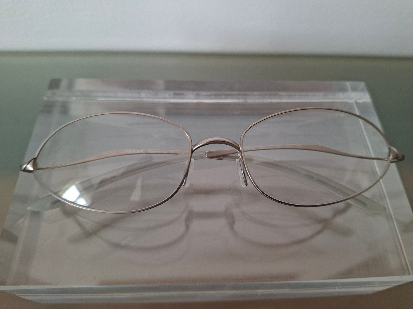 Vintage Prada VPR 67B 1AP 101 brilmontuur, Prada, Nieuw, Ophalen of Verzenden, Grijs
