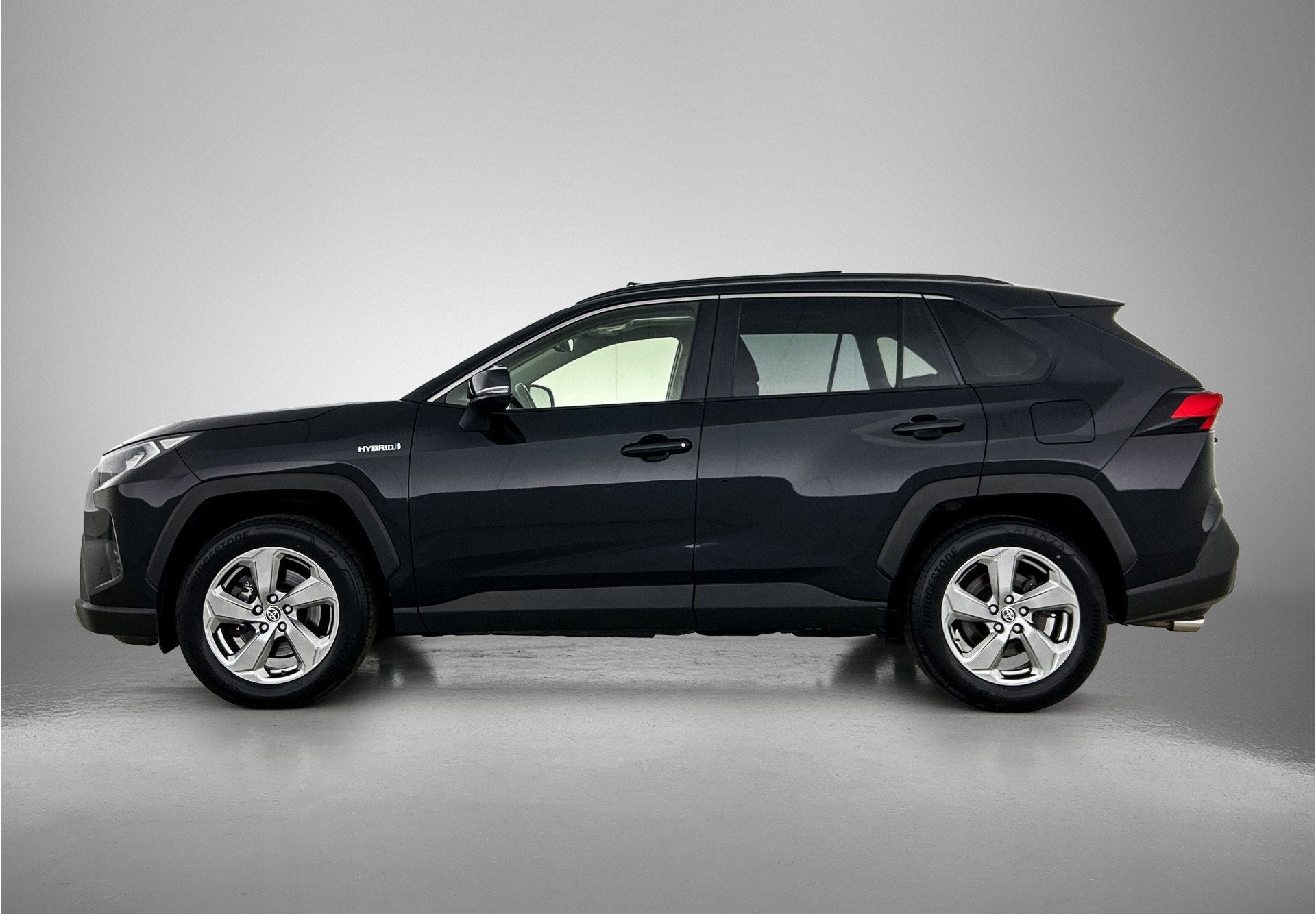 Toyota RAV4 2.5 Hybrid Dynamic | BTW voertuig | Panoramadak, Auto's, Toyota, Stof, Gebruikt, 4 cilinders, Zwart