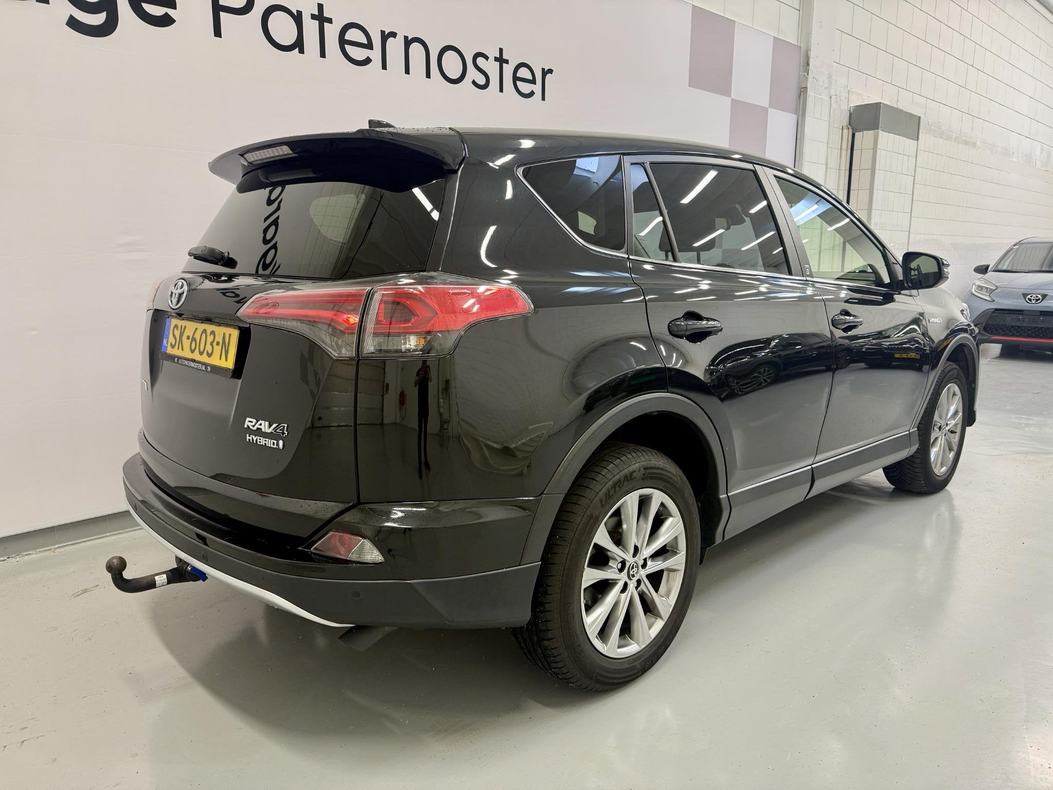 Toyota RAV4 2.5 Hybrid Dynamic Leer / PDC / Camera / Afneemb, Automatische klimaatregeling, Gebruikt, Euro 6, Zwart